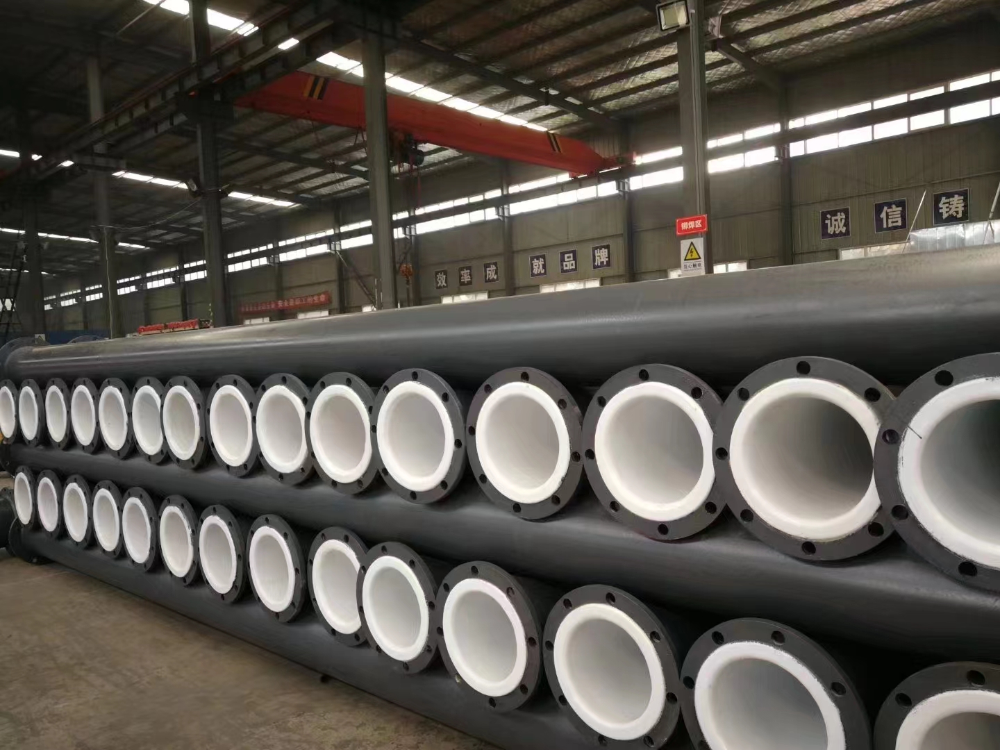 HDPE-lined steel pipe — warehouse